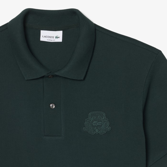 поло polo от бренда lacoste вид слева