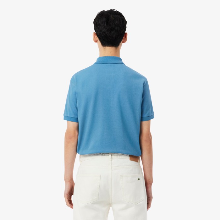 поло polo от бренда lacoste вид слева