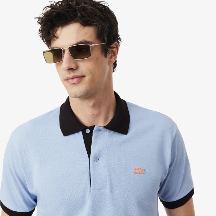 поло polo от бренда lacoste вид слева