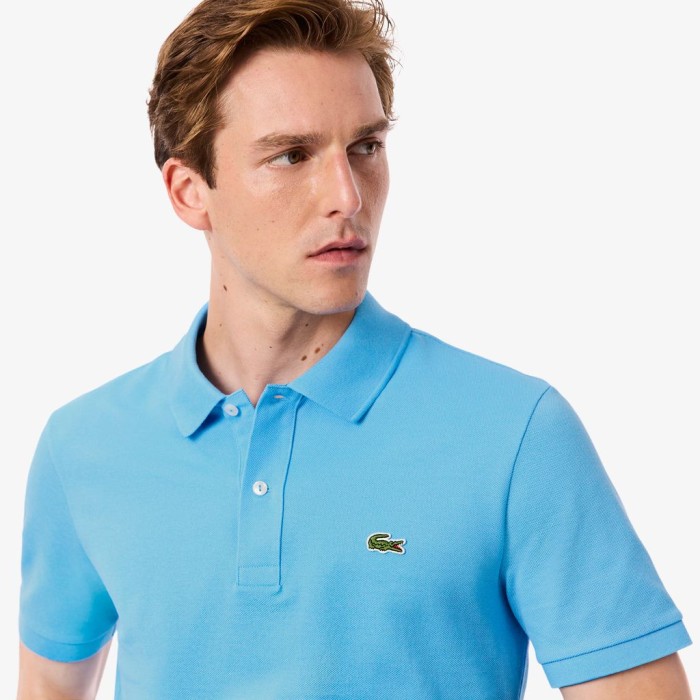 поло polo от бренда lacoste вид слева