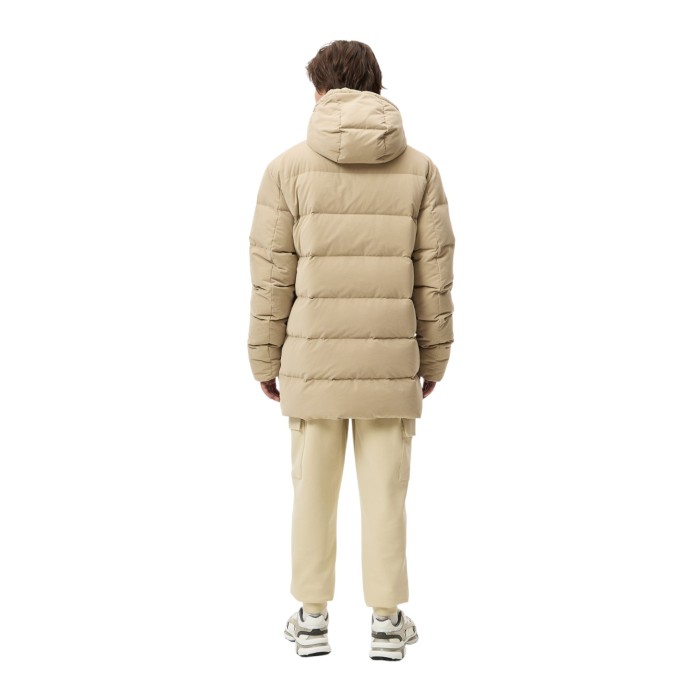пуховик long puffer от бренда lacoste вид слева