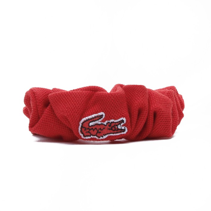 резинка hair tie от бренда lacoste вид слева