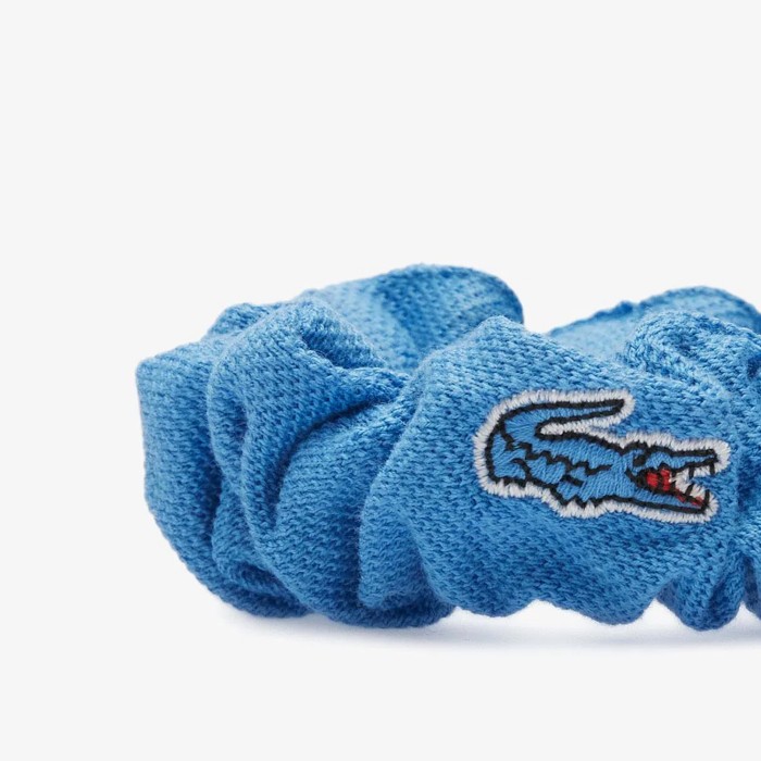 резинка headband от бренда lacoste вид слева