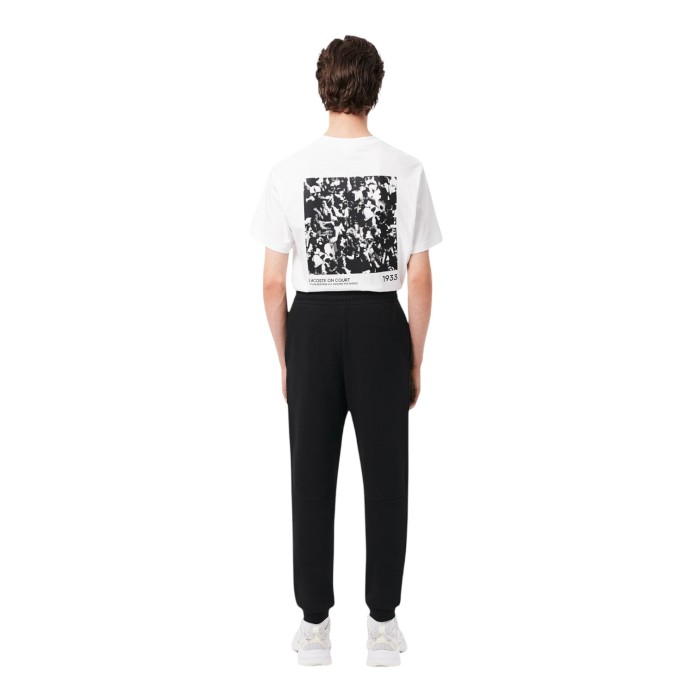 спортивные штаны classic french terry от бренда lacoste вид слева