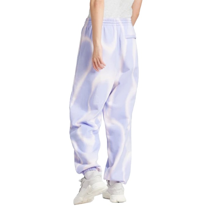 спортивные штаны dye allover print от бренда adidas вид слева