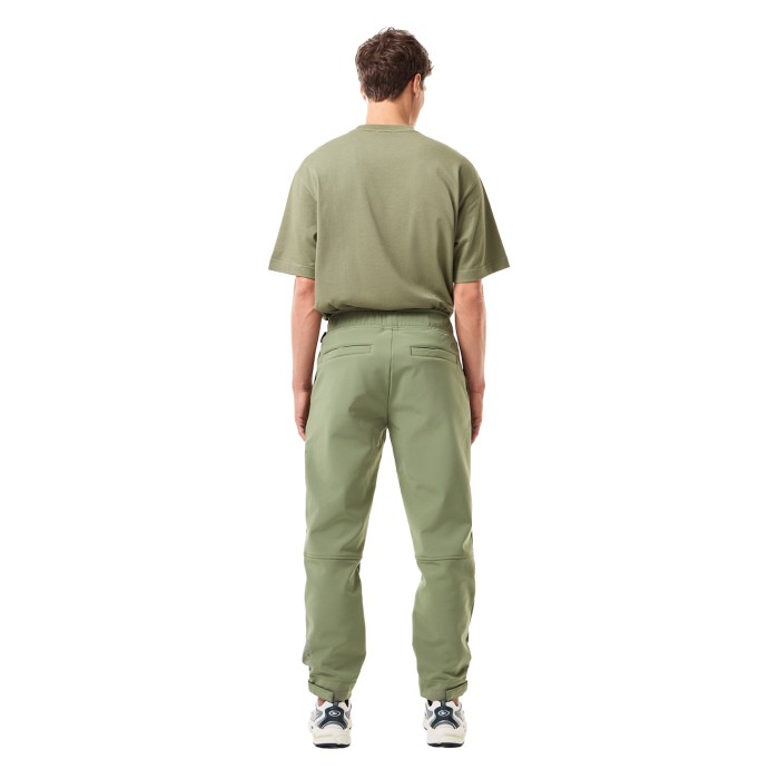 спортивные штаны флисовые водоотталкивающие брюки от бренда lacoste вид слева