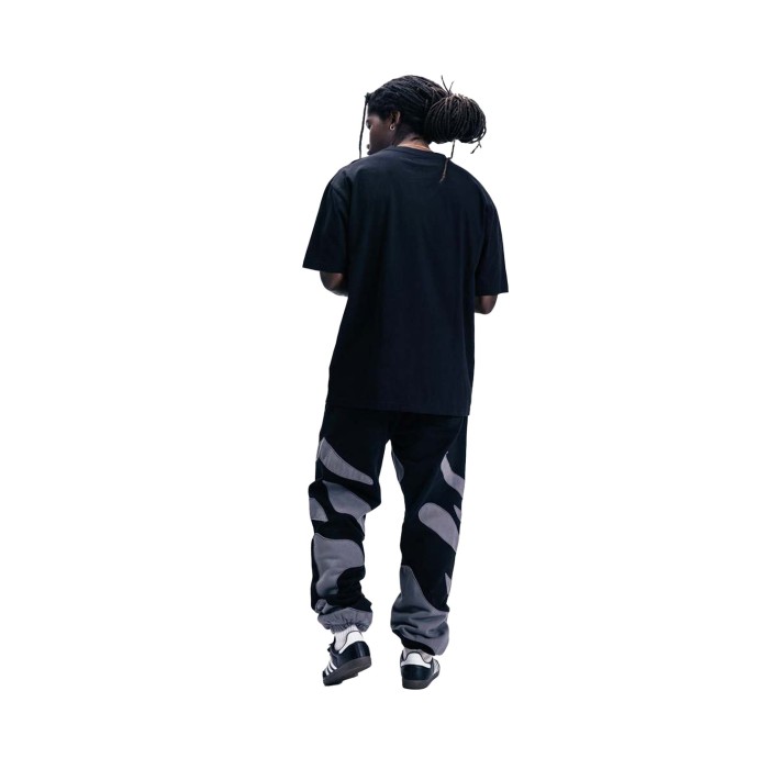 спортивные штаны peaked fleece pants от бренда market вид слева