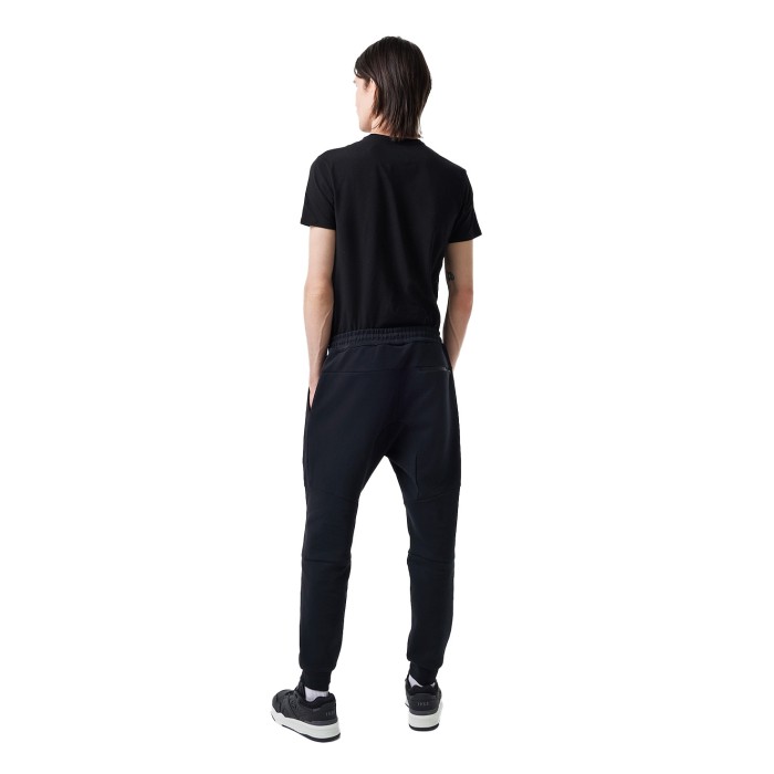 спортивные штаны regular fit от бренда lacoste вид слева