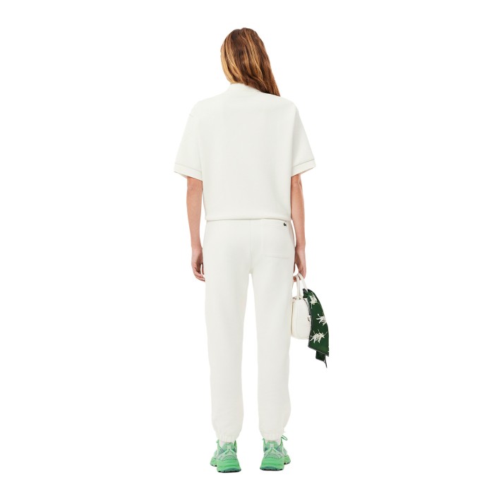 спортивные штаны sport от бренда lacoste вид слева