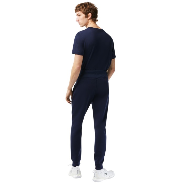 спортивные штаны sweatpants от бренда lacoste вид слева