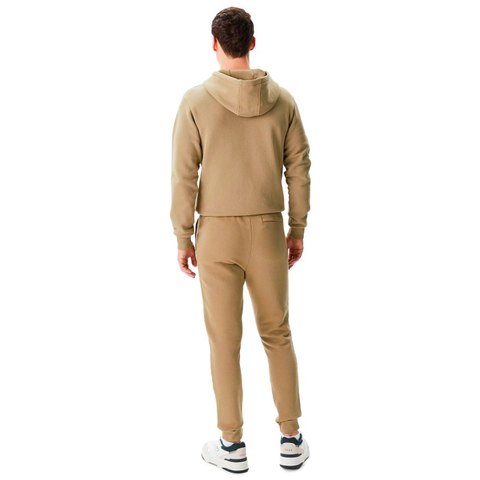 спортивные штаны sweatpants от бренда lacoste вид слева