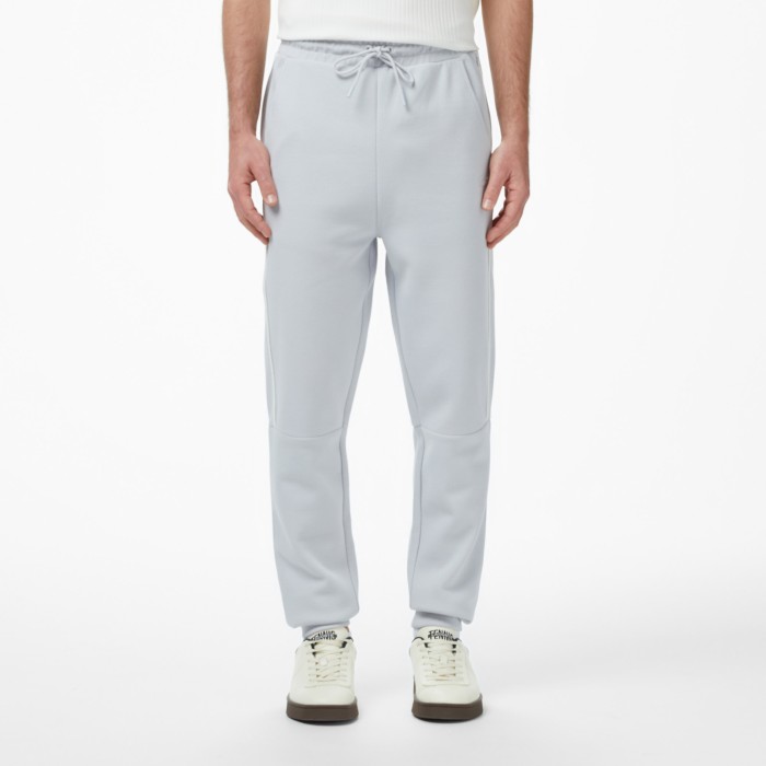 спортивные штаны sweatpants от бренда lacoste вид слева