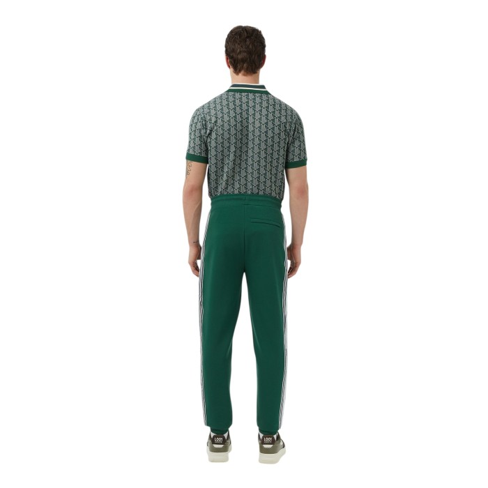 спортивные штаны sweatpants от бренда lacoste вид слева