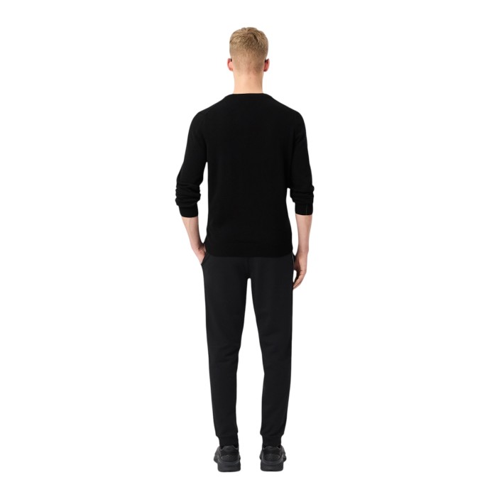 спортивные штаны sweatpants от бренда lacoste вид слева