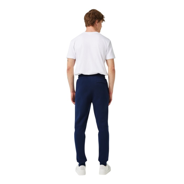 спортивные штаны sweatpants от бренда lacoste вид слева