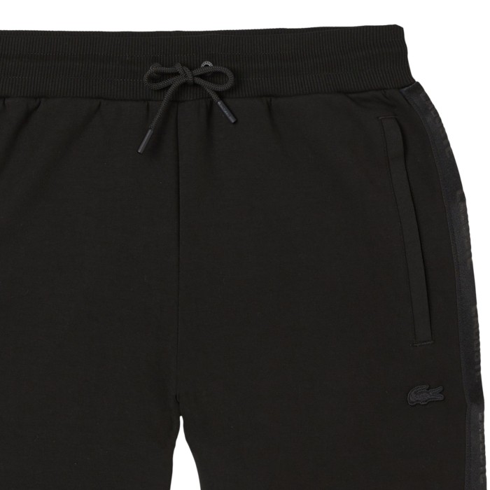 спортивные штаны tape tr 1 от бренда lacoste вид слева
