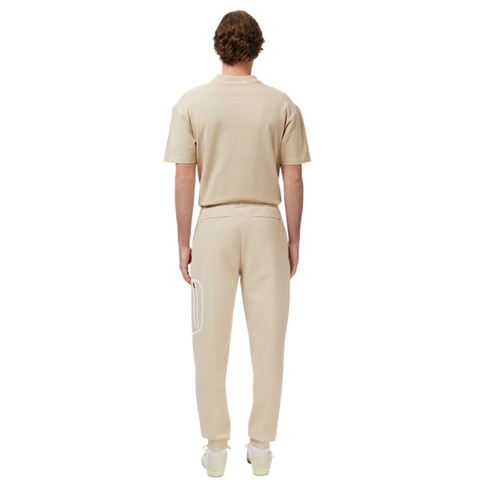 спортивные штаны tracksuit trouser от бренда lacoste вид слева