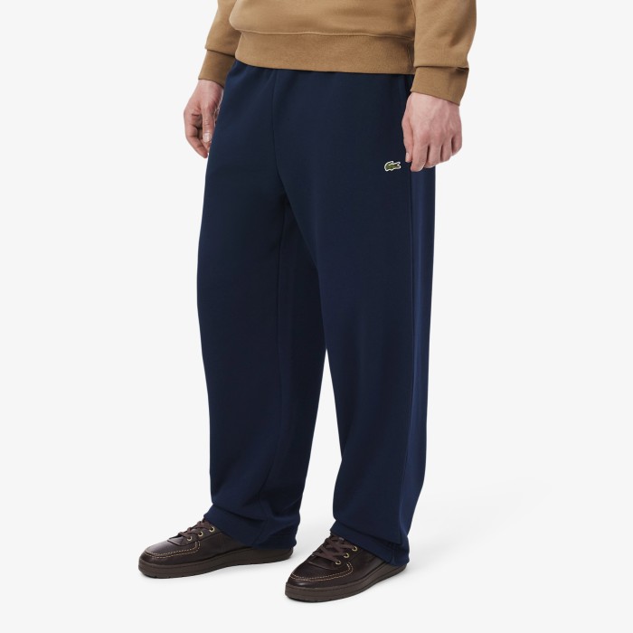 спортивные штаны tracksuit trousers от бренда lacoste вид слева