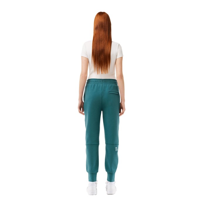 спортивные штаны tracksuit trousers от бренда lacoste вид слева