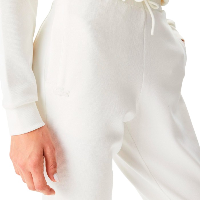 спортивные штаны tracksuit trousers от бренда lacoste вид слева