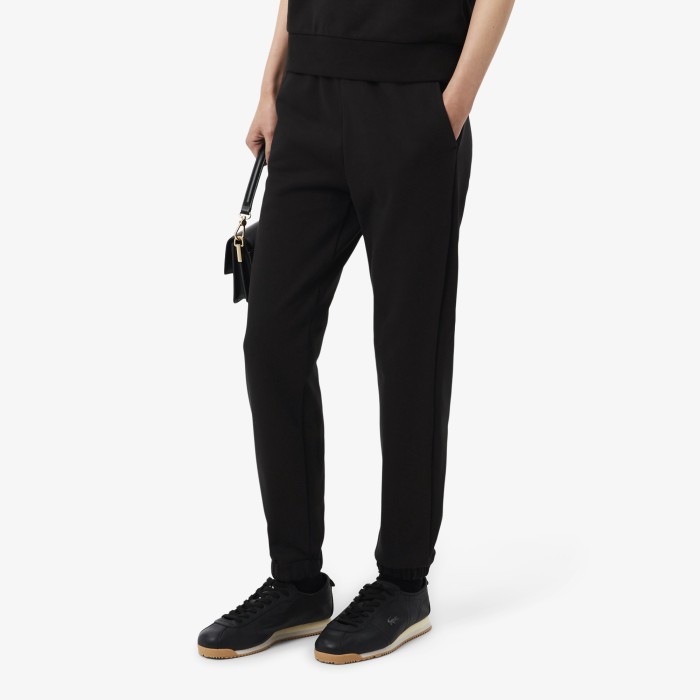 спортивные штаны tracksuit trousers от бренда lacoste вид слева
