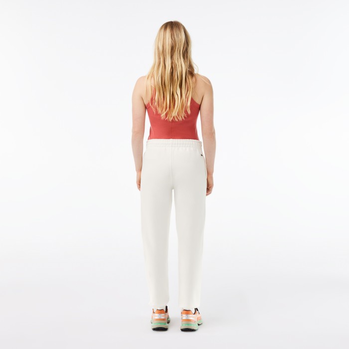 спортивные штаны tracksuit trousers от бренда lacoste вид слева