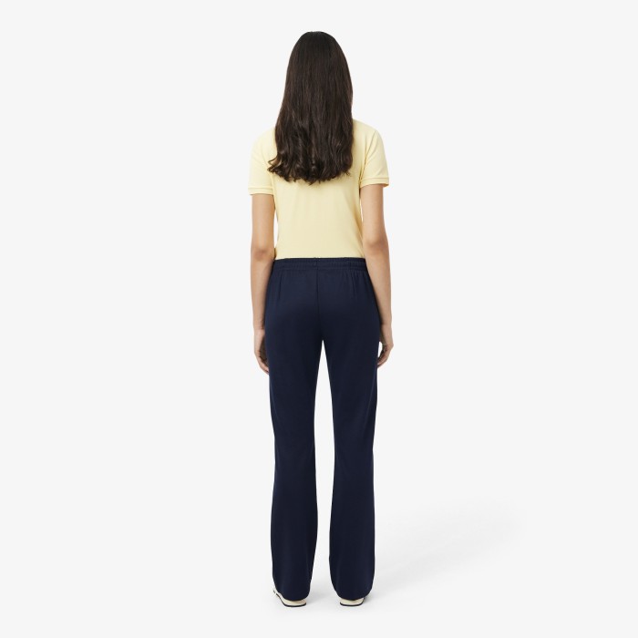 спортивные штаны tracksuit trousers от бренда lacoste вид слева