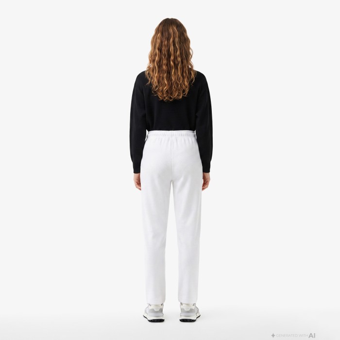 спортивные штаны tracksuit trousers от бренда lacoste вид слева