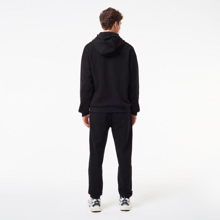 спортивные штаны tracksuit trousers от бренда lacoste вид слева