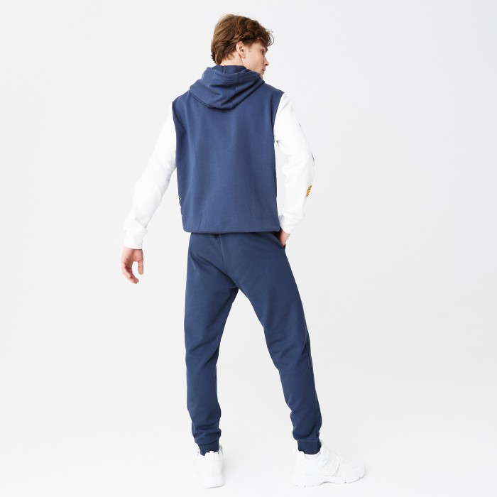 спортивные штаны tracksuit trousers от бренда lacoste вид слева