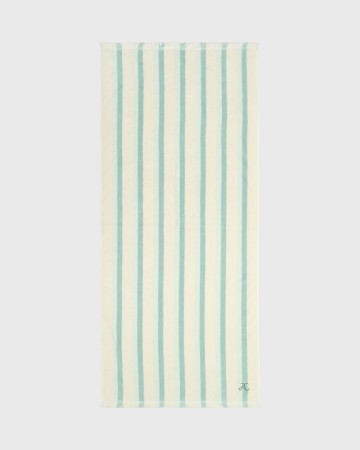 детское пляжное полотенце в полоску фотография