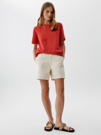 джинсовые шорты багги на резинке фотография