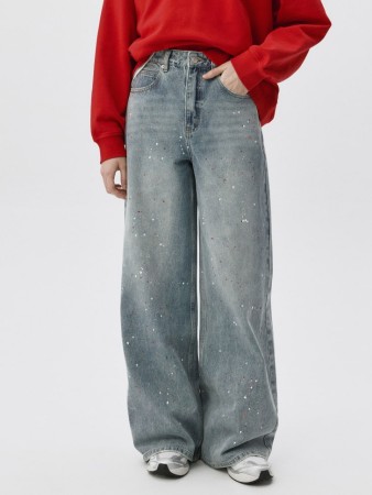 джинсы wide leg с декоративными брызгами фотография