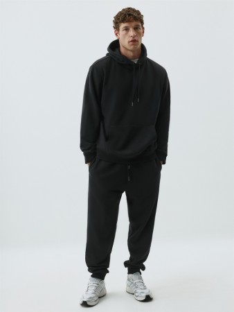 джоггеры из футера со средней посадкой - джоггеры на кулиске 