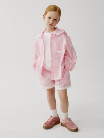 хлопковые шорты в клетку для девочек фотография