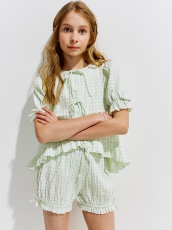 короткие шорты-блумеры в клетку для девочек фотография