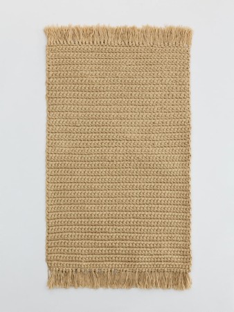 плетеный ковер фотография