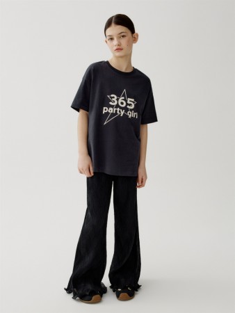 расклешенные брюки из фактурной ткани для девочек фотография