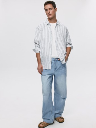 рваные джинсы wide leg фотография