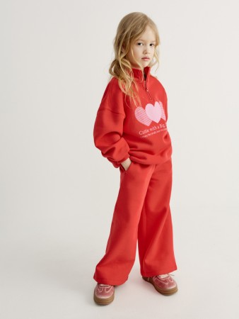 широкие брюки с  принтом для девочек фотография