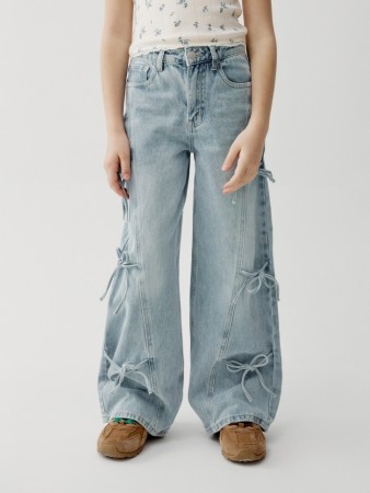 широкие джинсы с бантиками для девочек фотография