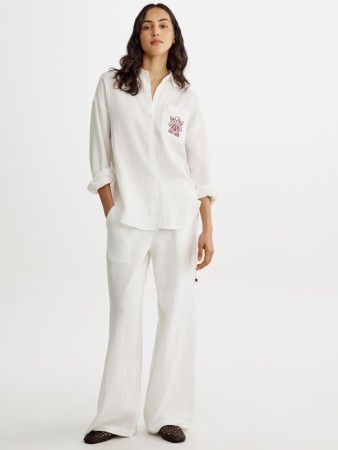 широкие муслиновые брюки с завязками по бокам фотография