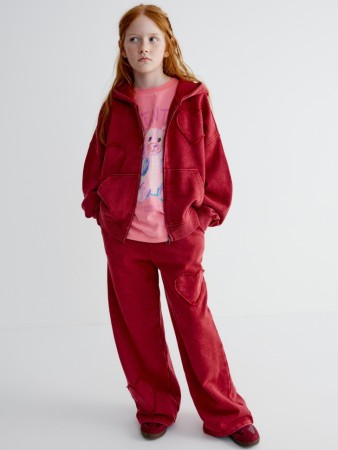 трикотажные брюки с аппликацией для девочек фотография