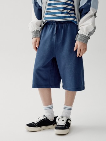 трикотажные удлиненные шорты для мальчиков фотография