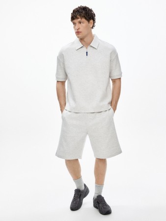 трикотажные удлиненные шорты фотография