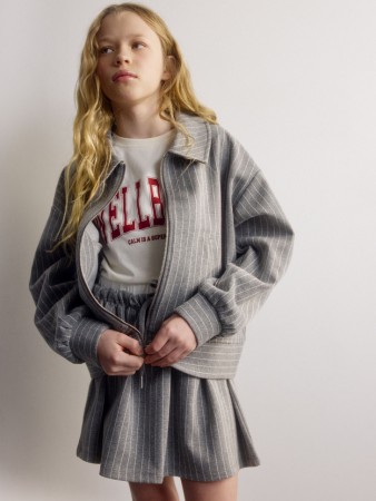 трикотажный жакет в полоску для девочек фотография