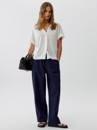 укороченные объемные брюки из хлопка фотография