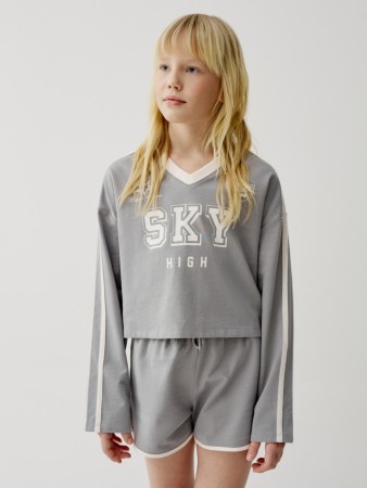 укороченный лонгслив в спортивном стиле для девочек фотография