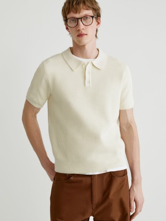 вязаное поло с коротким рукавом фотография