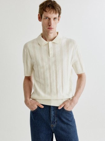 вязаное поло с коротким рукавом фотография